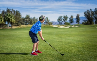 Photo of a Young Boy Golfing at One of the Best Sonoma County Golf Courses.