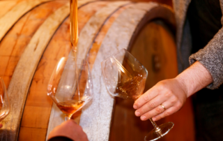 wine is served from a barrel for barrel tasting